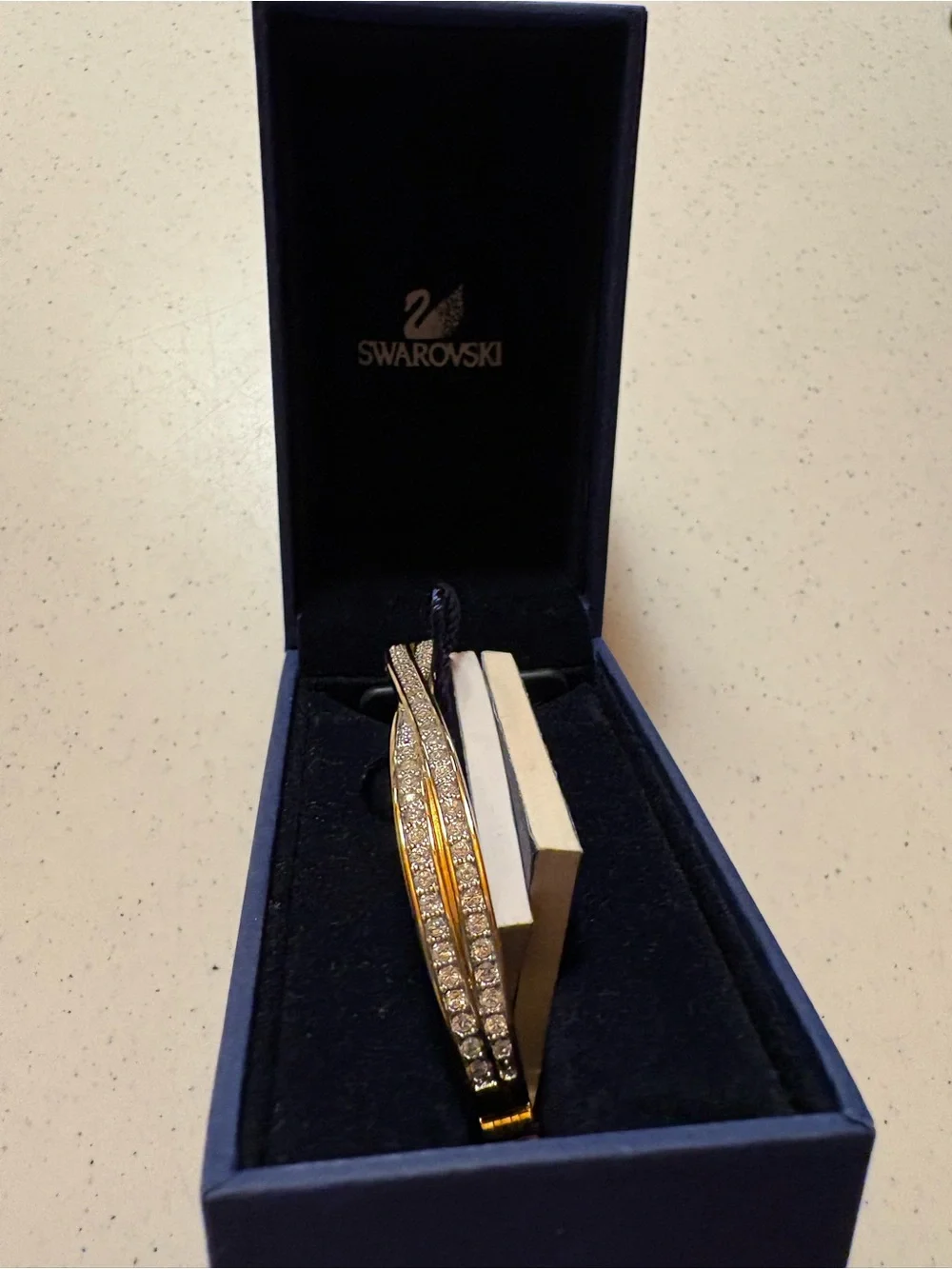 Swarovski Gold-Tone Crystal Twist Bangle bracelet- never worn!!